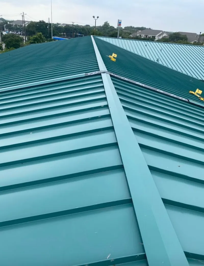 Green commercial metal roof ridge and valley for Metal Roof Repair in North Hills